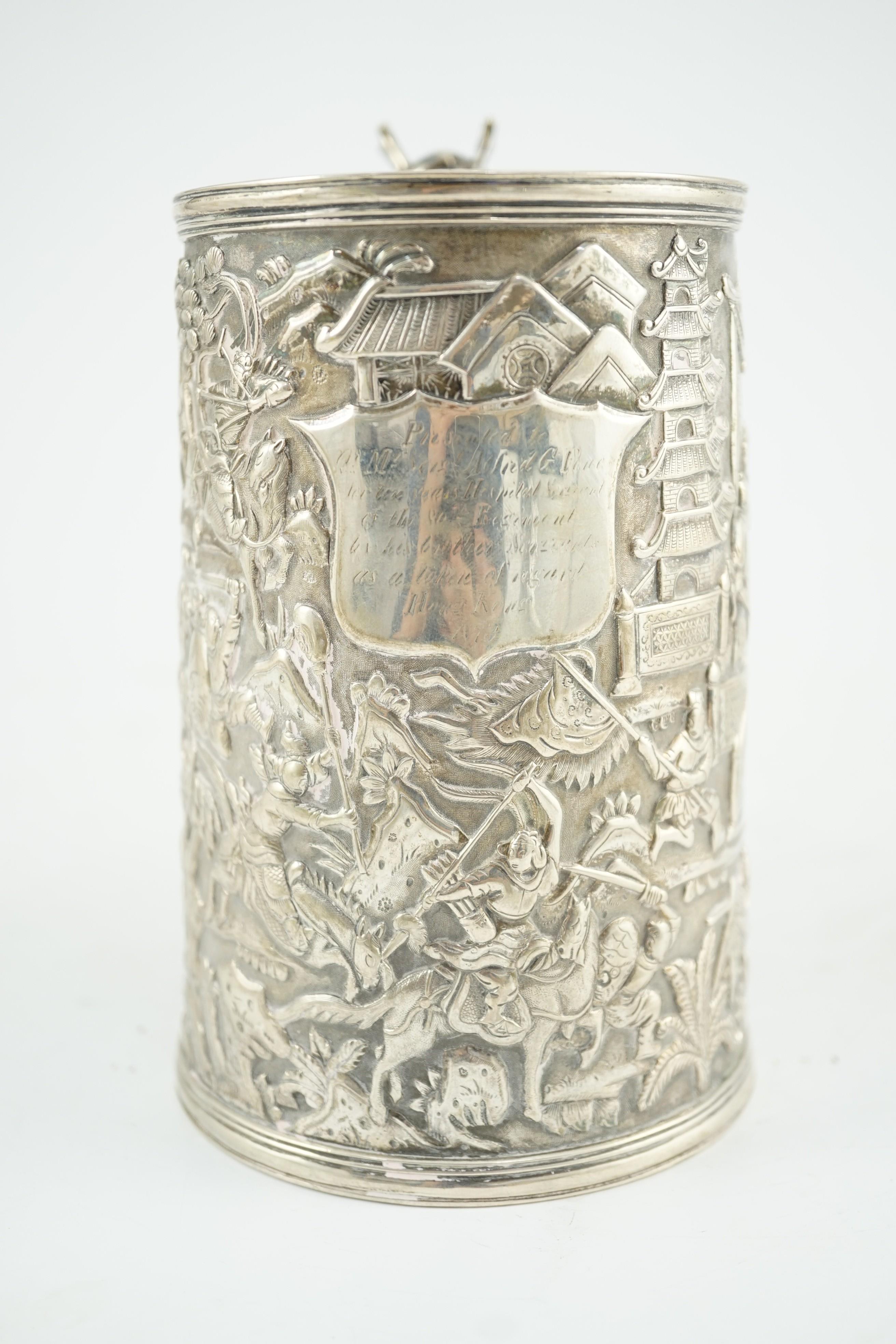 A late 19th century Chinese Export double skinned silver mug, by Leeching
